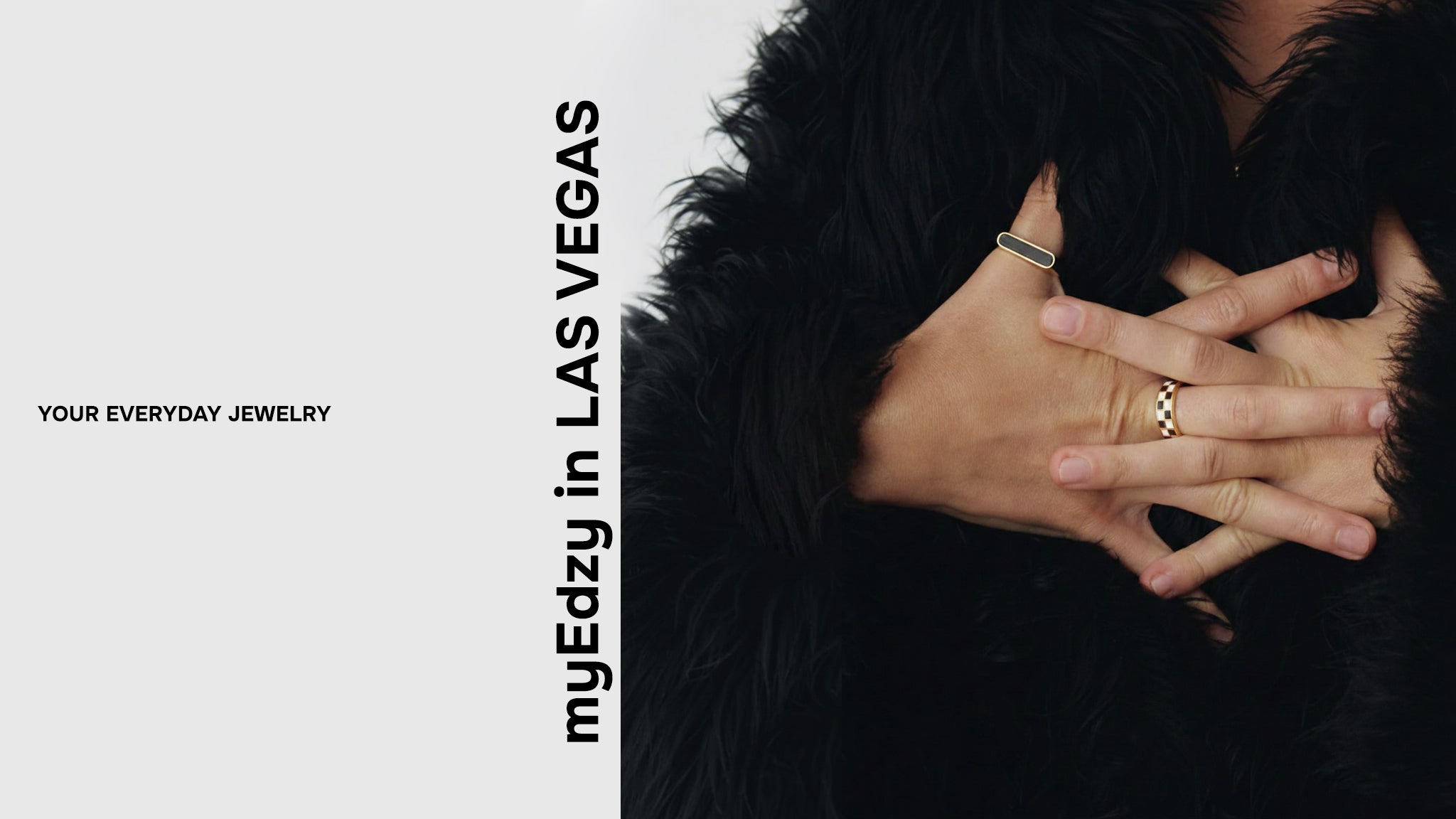 myEdzy in Las Vegas sub-banner featuring 18K gold rings on black fur background, luxury local jewelry brand.