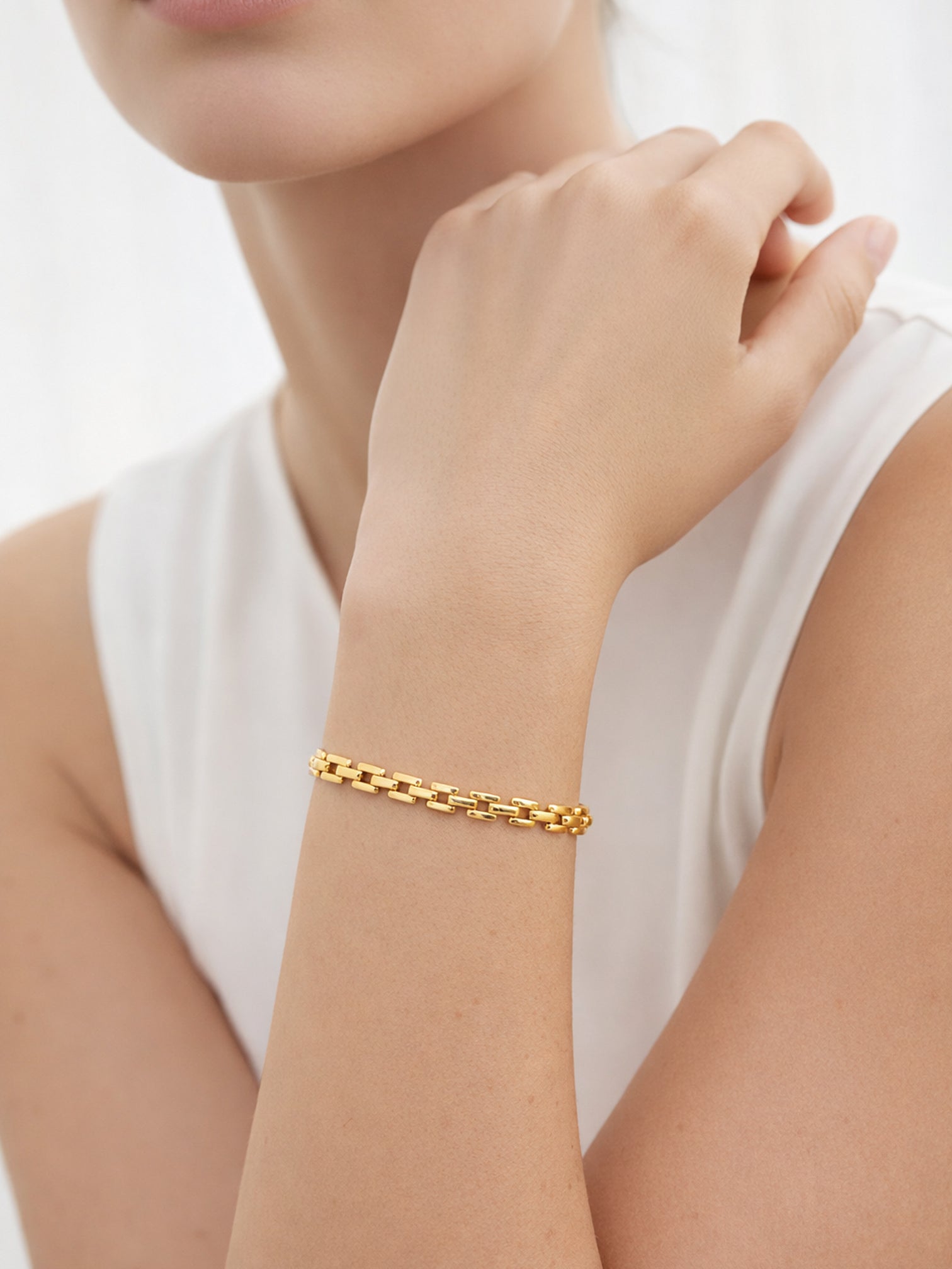 Sydney gold chain bracelet worn on wrist minimalist style