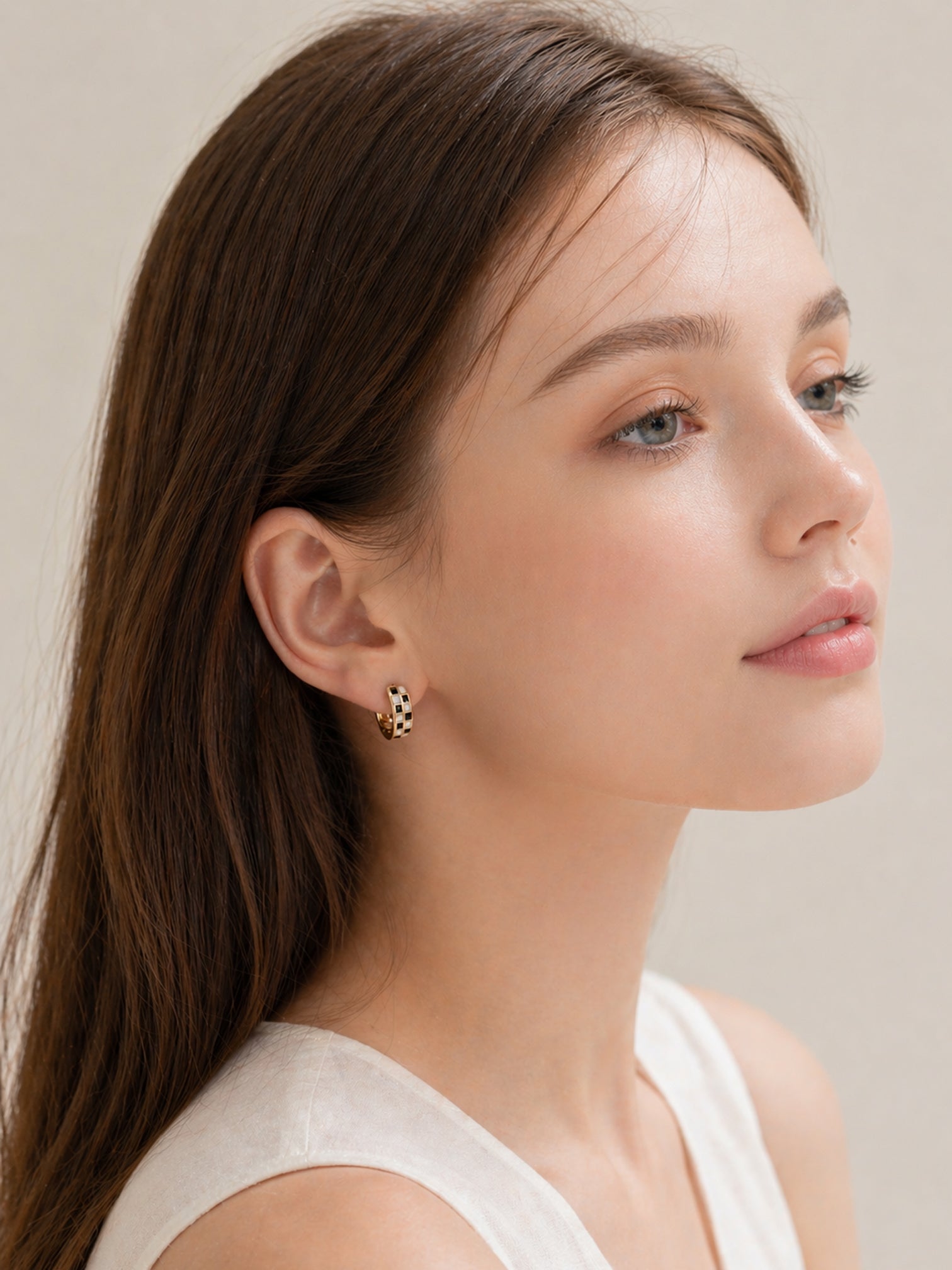 18k gold checker huggie hoop earrings black white enamel chunky mini hoops bold minimalist statement jewelry myEdzy side portrait