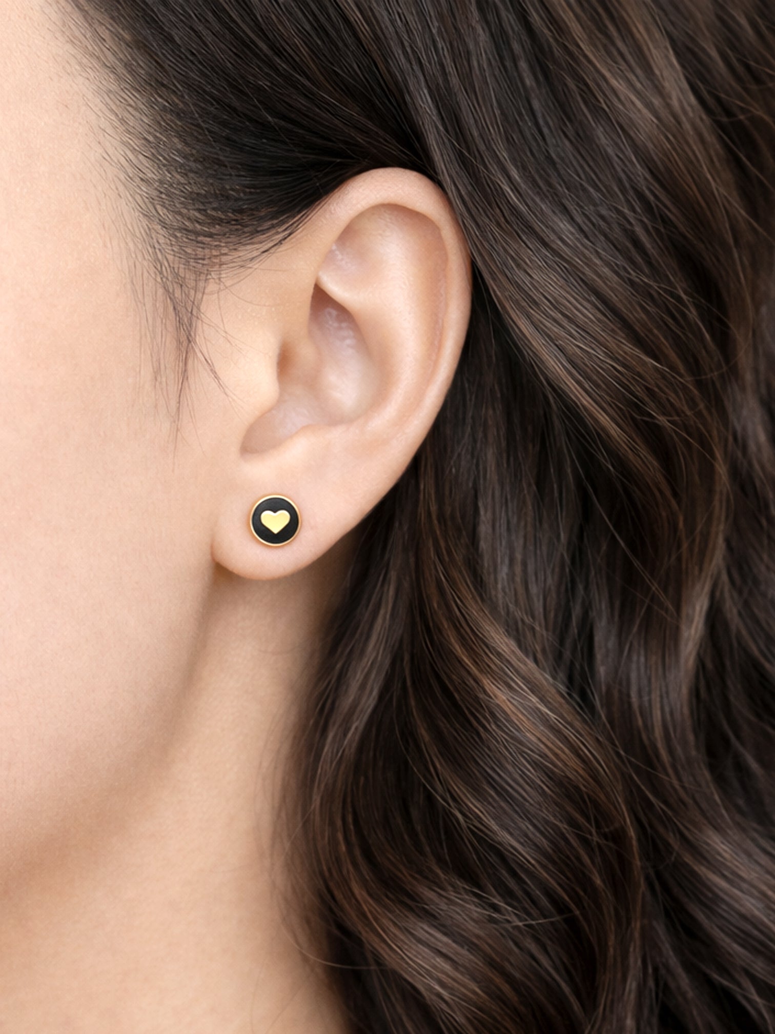 Venus 7mm gold heart screw back earrings worn on ear waterproof hypoallergenic titanium steel studs by myEdzy