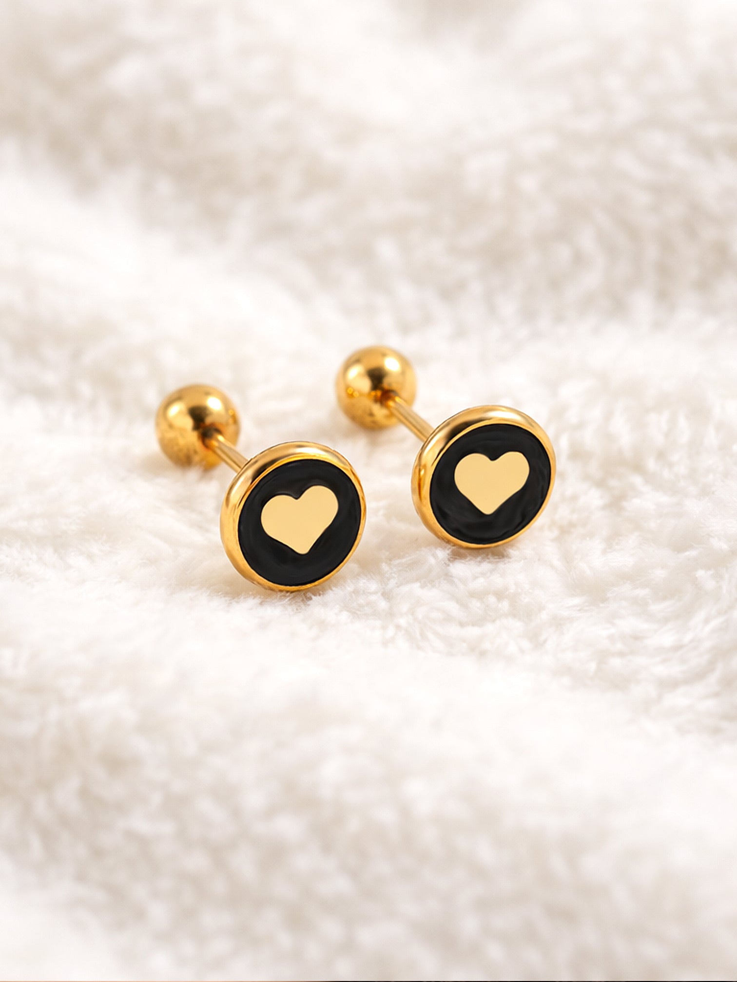 Venus 18K gold heart screw back earrings on soft white fabric waterproof hypoallergenic titanium steel by myEdzy