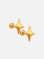 Polished 18K gold Starry screwback stud earrings with four-point star design and secure threaded backing, shown on a light gray background | myEdzy
