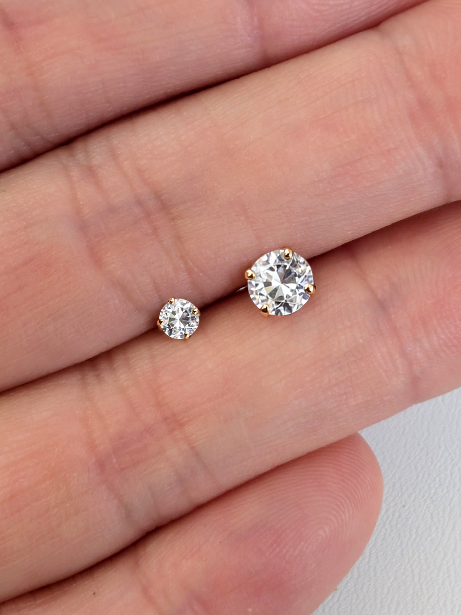 Cubic zirconia stud earrings size comparison on hand 18k gold screw back minimalist dainty jewelry everyday earrings | myEdzy