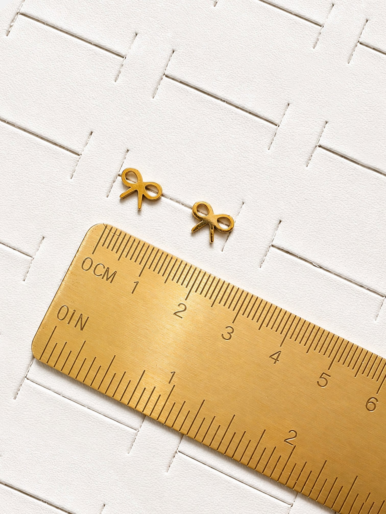 18k gold plated bow stud screwback earrings tiny dainty minimalist hypoallergenic waterproof tarnish resistant size reference myEdzy