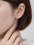 18k gold triangle stud earrings screwback minimalist geometric dainty hypoallergenic everyday jewelry myEdzy close up ear