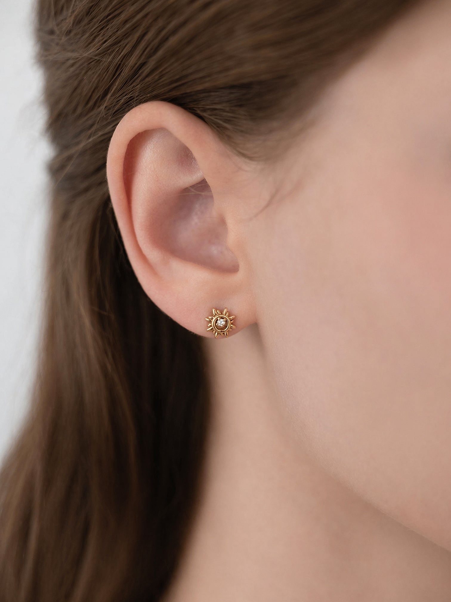 18k gold plated sunburst screwback stud earrings cubic zirconia dainty minimalist hypoallergenic earrings for sensitive ears everyday jewelry myEdzy close up