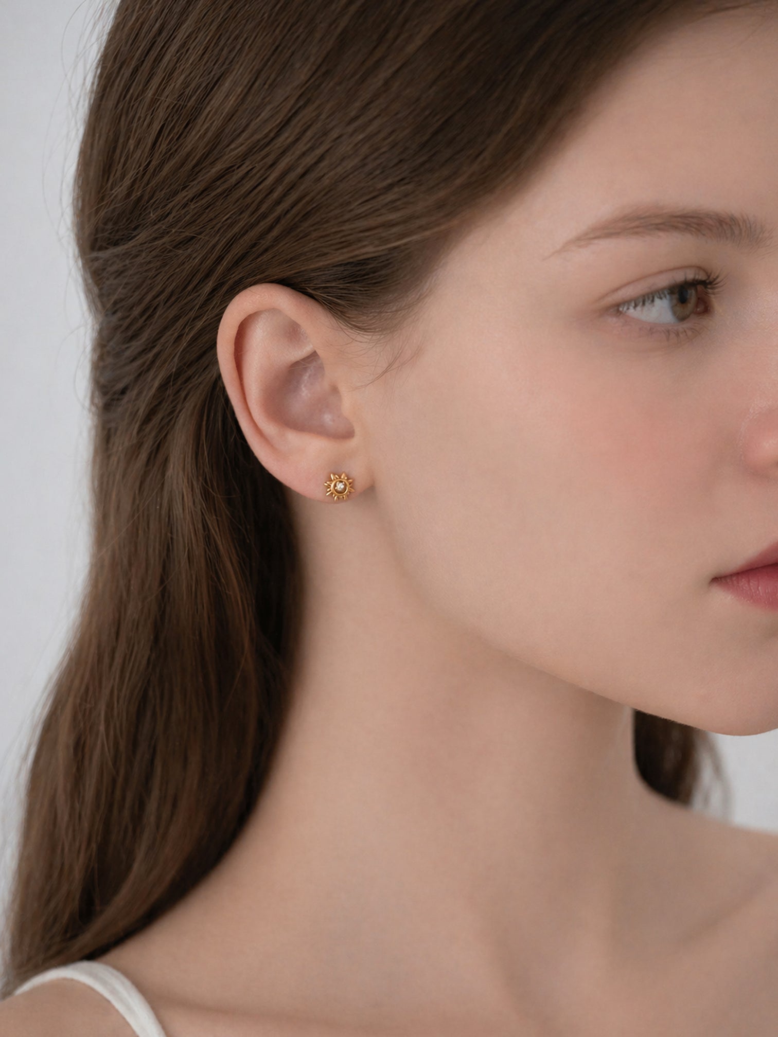 18k gold plated sunburst cz screwback stud earrings dainty minimalist hypoallergenic earrings everyday jewelry myEdzy model side profile