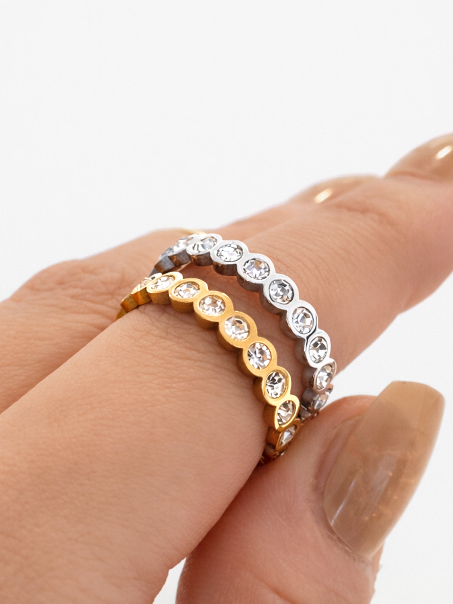 Jenae cubic zirconia eternity ring worn on finger minimalist style