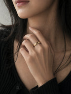 18k gold faceted geometric band ring modern minimalist statement ring waterproof tarnish resistant hypoallergenic everyday jewelry myEdzy model hand close up