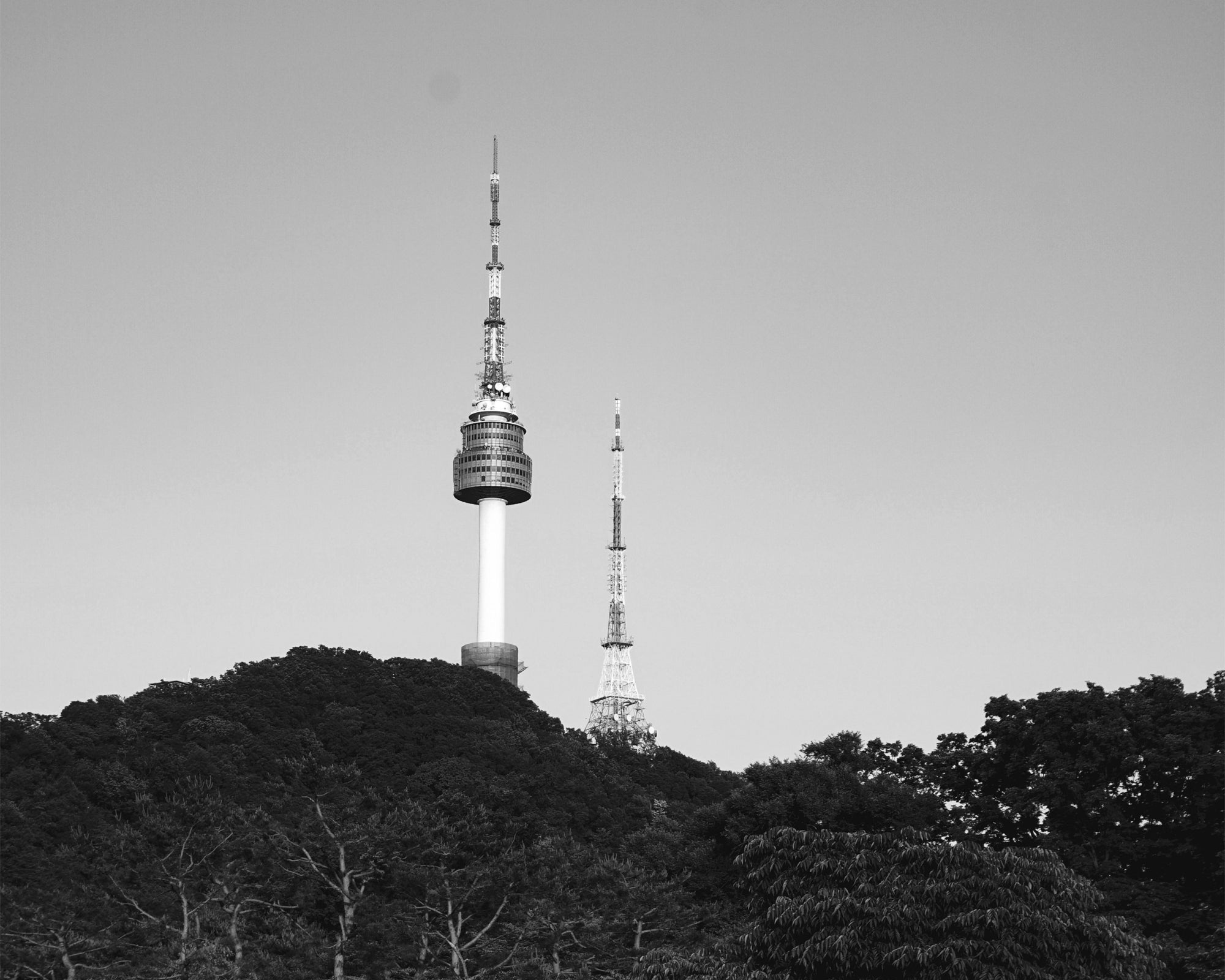 Black and white view of Seoul’s Namsan Tower, reflecting the roots of a Las Vegas jewelry brand myEdzy inspired by Asian minimalism and global cities
